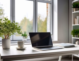 Fototapeta premium A stylish, tidy office with Scandinavian design: a simple white desk featuring a laptop, a cup of coffee, and a small green plant. large windows let in natural light. Perfect for business