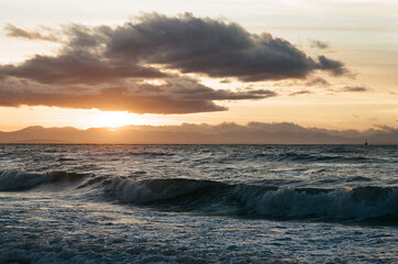 Sunset and ocean wave 