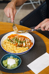 Paprika chicken with spaetzle and cucumber salad