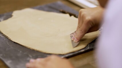 Hands Skillfully Creating Beautiful Clay Art in a Creative Workshop Setting for Learning. Stock Clip