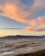 Sunset and clouds at the beach