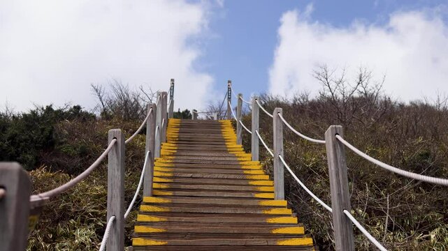 Hallasan National Park, Jeju island, South Korea, spring view of Yeongsil trail with a wooden ladder path stairs, trekking and climbing, stairway to Halla mountain, hiking in Korea, Jeju-do, sunny day