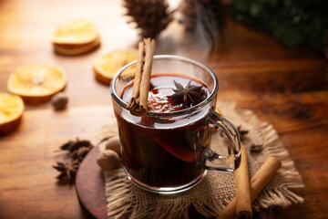 Spiced wine or Christmas mulled wine with orange, cinnamon, star anise, clove, nutmeg and other...