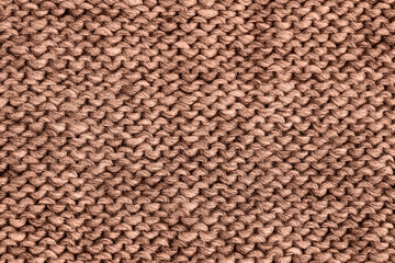 Brown mocha mousse color knitted texture. Handmade Knitwear. Background