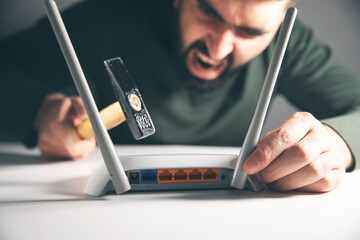 angry man with wifi router