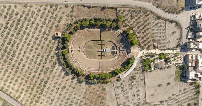 Aerial perpendicular view of the Roman amphitheater of Lucera, in the province of Foggia, Puglia, Italy. It is a Roman amphitheater.