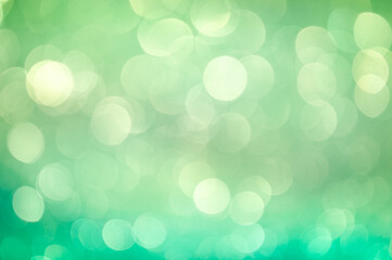 Soft green bokeh creates a tranquil atmosphere for relaxation and meditation