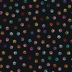Multi colored vibrant paw print seamless fabric design repeated pattern