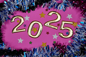 golden numbers 2025 two thousand twenty five new year with colorful tinsels and stars confetti on pink background