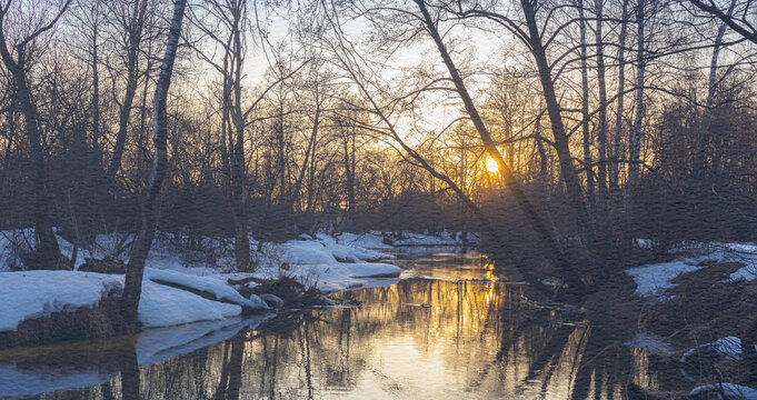 River with a sun reflecting on the water - Powered by Adobe