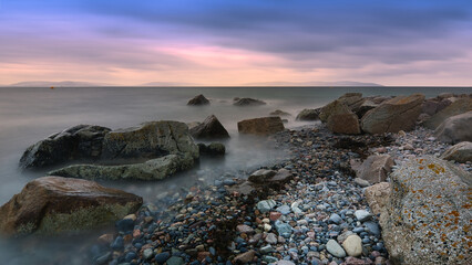 Beautiful coastal landscape sunset scenery, rocky beach, Salthill at Galway, Ireland, nature background
