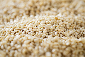 Sesame seeds background on top.