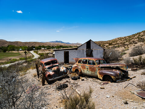 Abandoned cars and residence outside Monticello, New Mexico