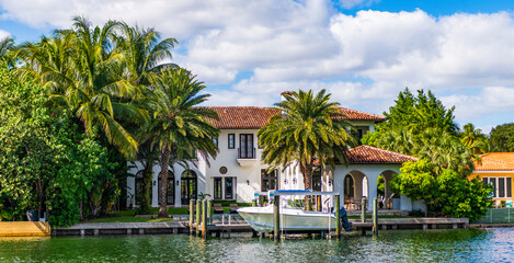 Fototapeta premium Modern building. Residential apartment in waterfront city. City waterfront with house. Vacation building in summer. Luxury waterfront house. Hotel building architecture. Luxury vacation