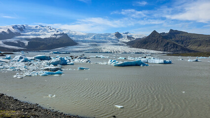 Melting glaciers and shimmering icebergs in a pristine Icelandic natural reserve