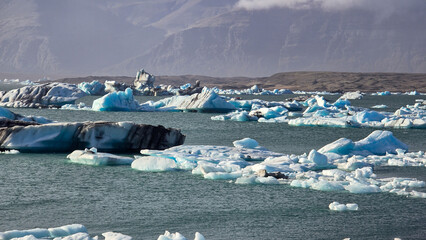Melting glaciers and shimmering icebergs in a pristine Icelandic natural reserve