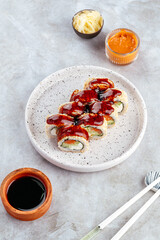 traditional Japanese sushi rolls on a plate