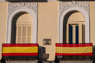 Spanish flags are placed at the balconies in Puerta del Sol, Madrid, Spain, during the celebration of The Constitution Day
