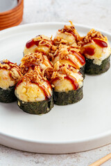 traditional Japanese sushi rolls on a plate