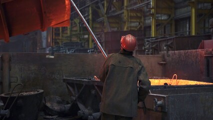 Hot Metal Pouring in foundries involves various techniques and specialized equipment. Stock Clip
