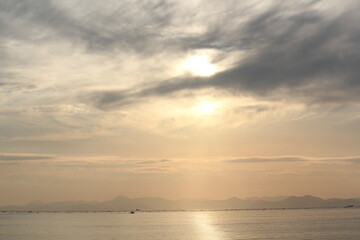 Image of a beautiful fantasy cloud and sunset spread across the sky at Dadaepo Beach in Busan
