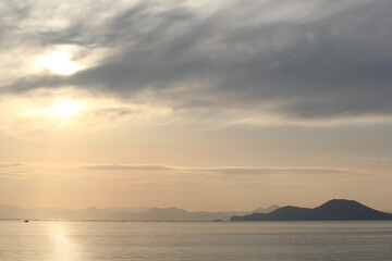 Image of a beautiful fantasy cloud and sunset spread across the sky at Dadaepo Beach in Busan
