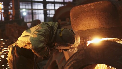 Fototapeta premium The Intense Melting Process That Takes Place in a Modern Industrial Steel Factory Setting. Stock Clip
