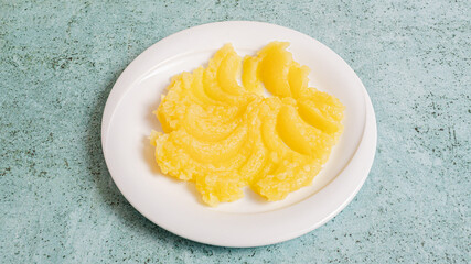 Mashed potatoes on plate top view