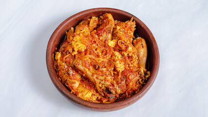 Roasted chicken in egg sauce in pot. Cigirtma - Azerbaijani dish