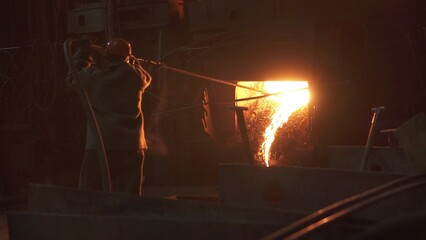 The Art of Crafting Metal in a Fiery Forge with Passion and Skill for Masterpieces. Stock Clip