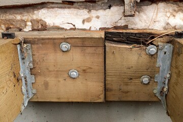 Deck Ledger Board Incorrectly Installed over Wood Siding has led to Extensive Dry Rot and Damage