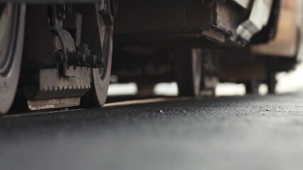 Close Up of Various Industrial Vehicle Wheels on Smooth Asphalt Surface for Clarity and Detail....