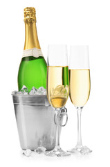 Champagne and bucket with ice isolated on white