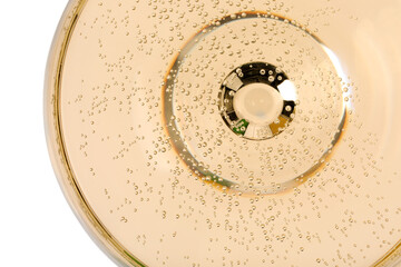 Champagne in glass isolated on white, top view