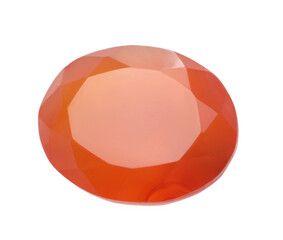 One orange shiny gemstone isolated on white