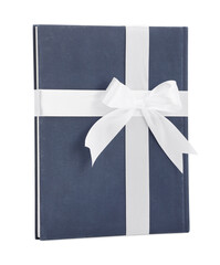 One book with silk ribbon as gift isolated on white
