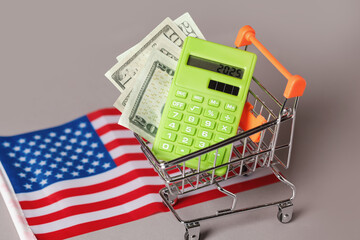 Shopping Cart trolley, Green Calculator, American Flag. Concept Inflation for Grocery Expenses and Consumerism. Cost of Living. Sustainability 