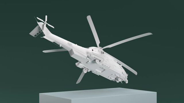 A white helicopter is flying in the air