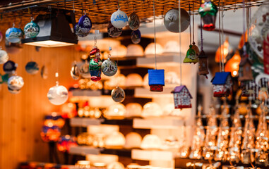 Christmas market with decorations and lights, Christmas balls. Abstract background