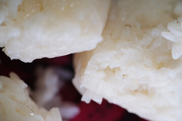 Tapai Pulut Daun Getah is a traditional Malaysian dessert of fermented glutinous rice wrapped in the leaf of a rubber tree