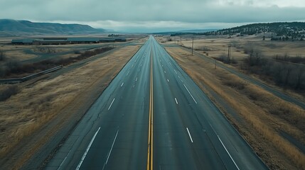 Endless Open Highway in Vast Open Plains Under Overcast Skies in Autumn : Generative AI