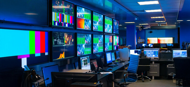 abstract background with interior of control room in TV studio with monitors and equipment for banner background 