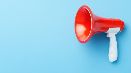 A red megaphone on a blue background, used for amplifying sound.