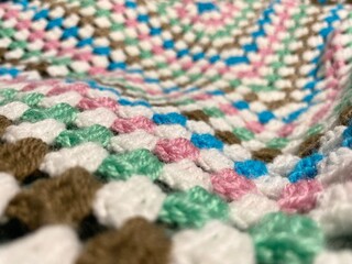 Crochet blanket handmade texture decor artistic background cozy worm photo 
