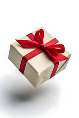 Obraz premium Simple white paper craft gift box with red ribbon bow in dynamic angle. Background, anniversary and special day with present, wallpaper, with copy space 