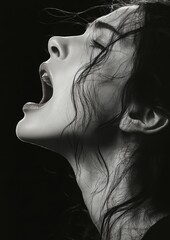 Fototapeta premium Close-up of woman screaming with raw emotional energy