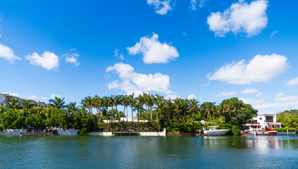 Fototapeta premium Residential apartment in waterfront city. City waterfront with house. Vacation building in summer. Luxury waterfront house. Hotel building architecture. Resort hotel. Modern building