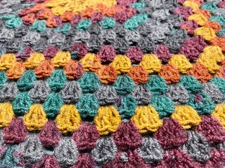 Crochet blanket handmade texture decor artistic background cozy worm photo