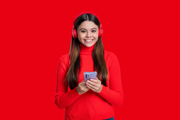 Mp3 music player. Generation z lifestyle. Millennial girl choose song in playlist. Teen girl...