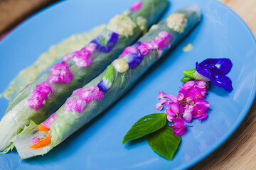 Fresh, colorful salad with vibrant vegetables on a white plate